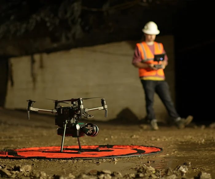 Operator using Exyn underground mapping equipment